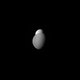 Illustration for article titled Two Of Saturns Moons Play Hide-And-Seek In This Stunning Image